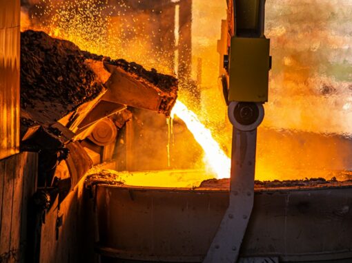 Pouring molten aluminum in an industrial casting process